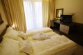 Ložnice v hotelovém pokoji Diplomat